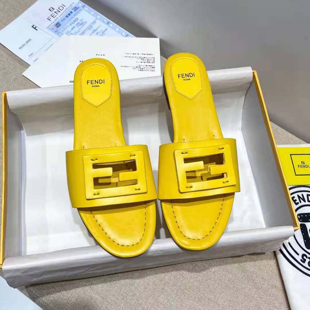 fendi slides yellow