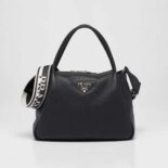 Prada Women Large Leather Handbag with the Prada Metal Lettering Logo Gleaming at Its Center-Black