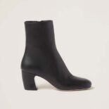 Miu Miu Women Leather Booties with Metal Lettering Logo-Black