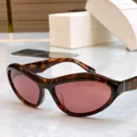 Prada Unisex Swing Sunglasses SPRA20_E16K_F05S0_C_A063