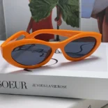 Prada Unisex Symbole Sunglasses-Orange SPR26Z_E16K_FE08Z_C_A056