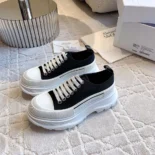 Alexander Mcqueen Unisex Tread Slick Lace Up in Black/White